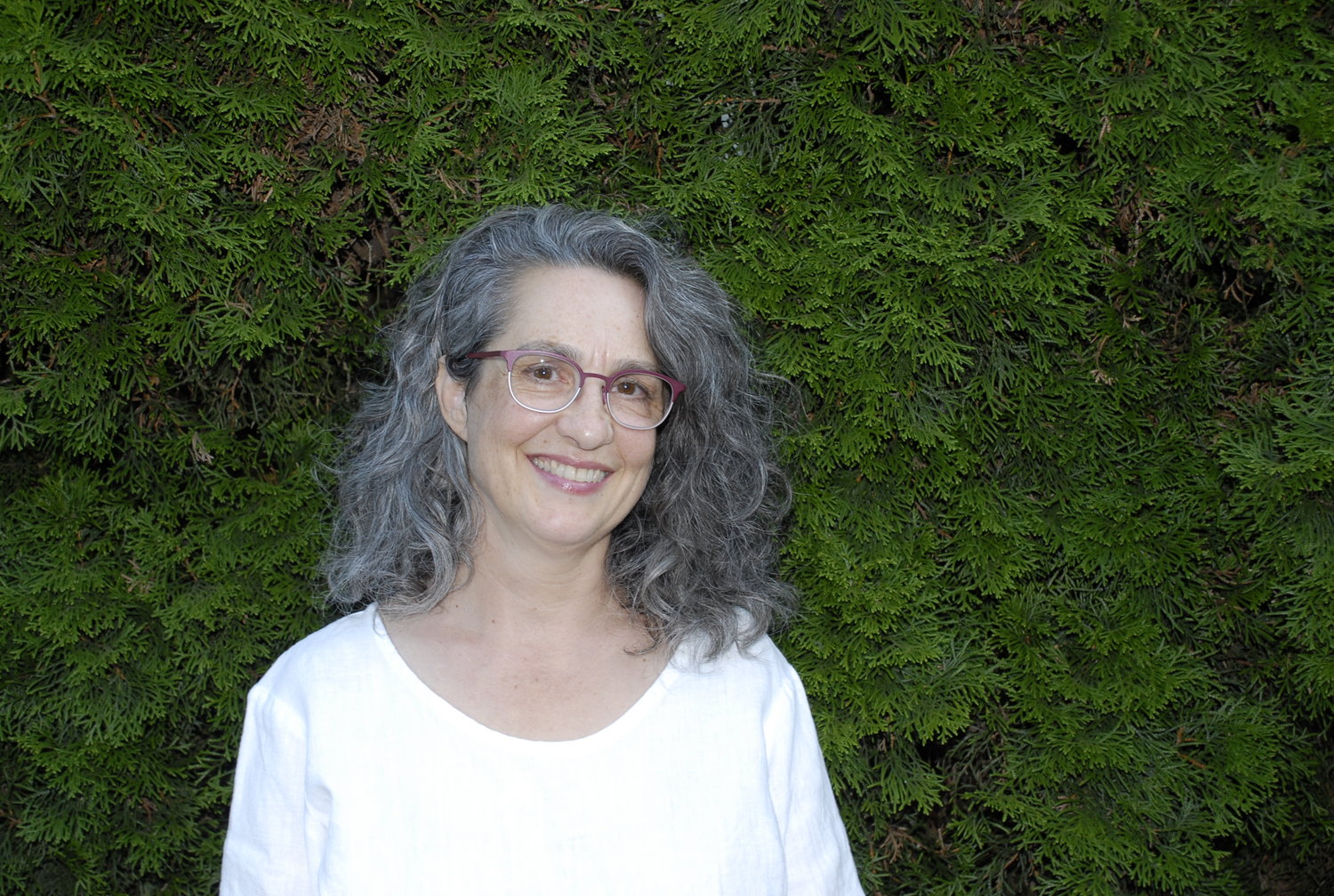 Ann Stinson, pictured here, has written her literary memoir, “The Ground at My Feet: Sustaining a Family and a Forest,”